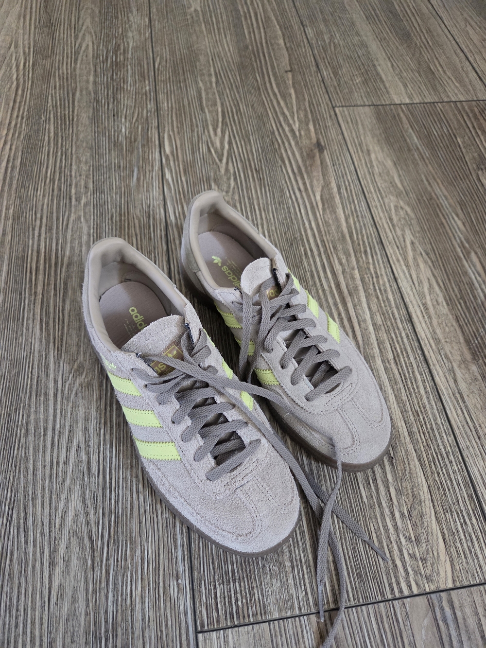 adidas Handball Spezial Sneakers in Beige with Neon Yellow Stripes